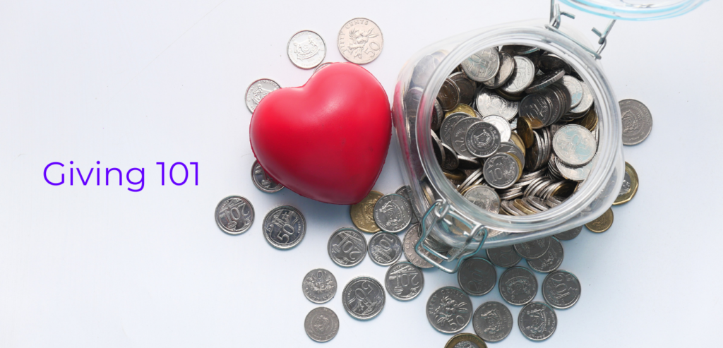 Title image for Giving 101 guide showing coins in a jar and a heart